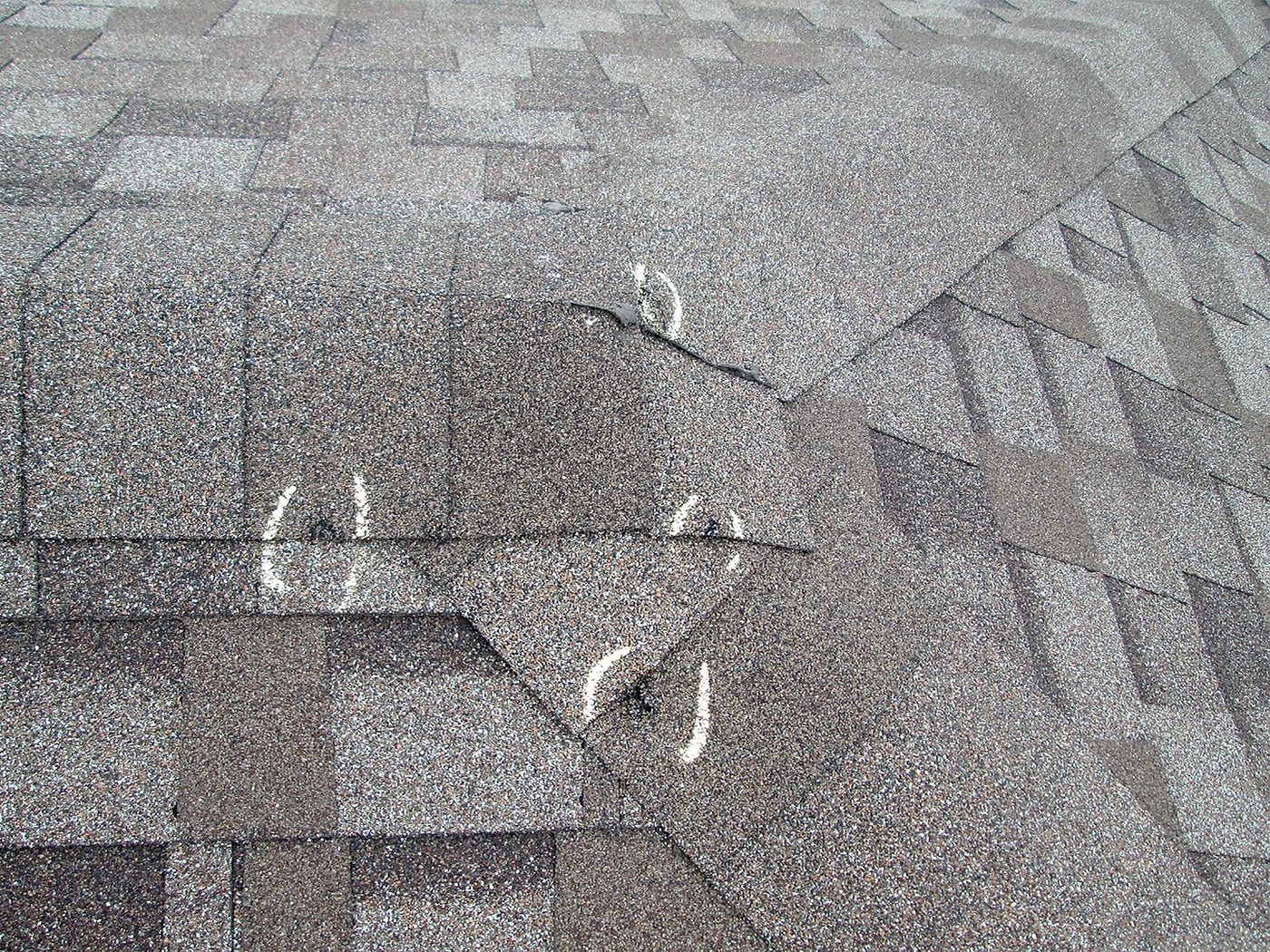 Midwest hail damage roofing company impact marks - Springfield MO